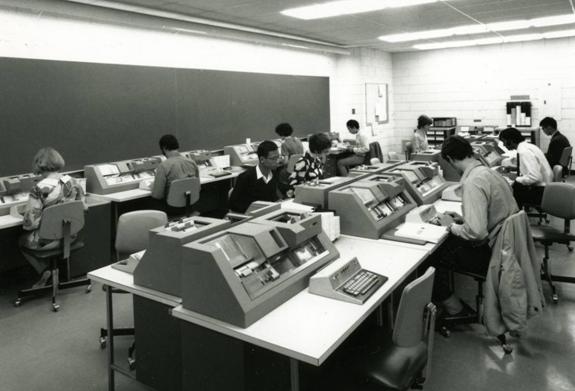 Students operating IBM 029 keypunches in the keypunch room of the Mathematics and Computer Building during the ‘67-’68 school year.