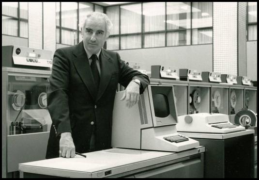 Wes Graham at UW surrounded by the computers which he had used so effectively to make Waterloo known world wide