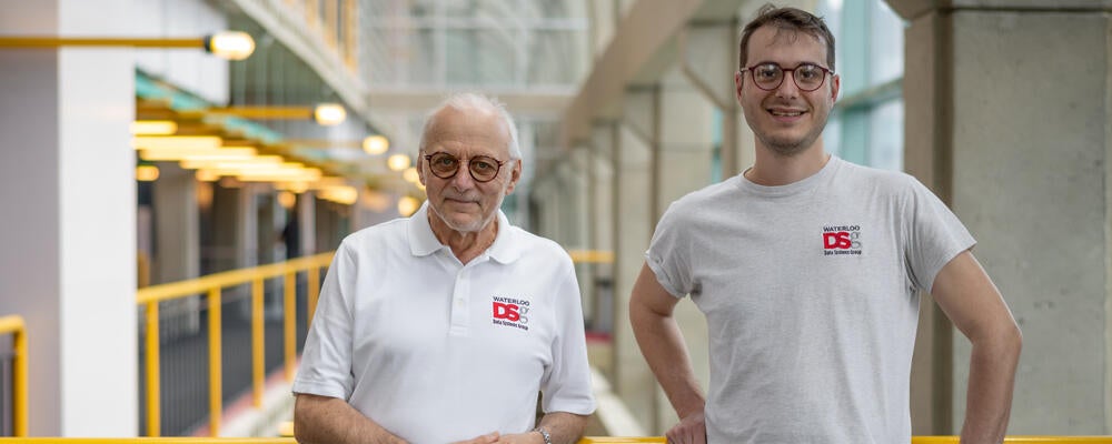 photo of Professor M. Tamer Özsu and Anil Pacaci