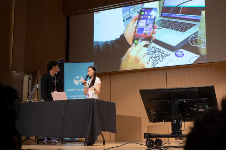 image of students presenting an app