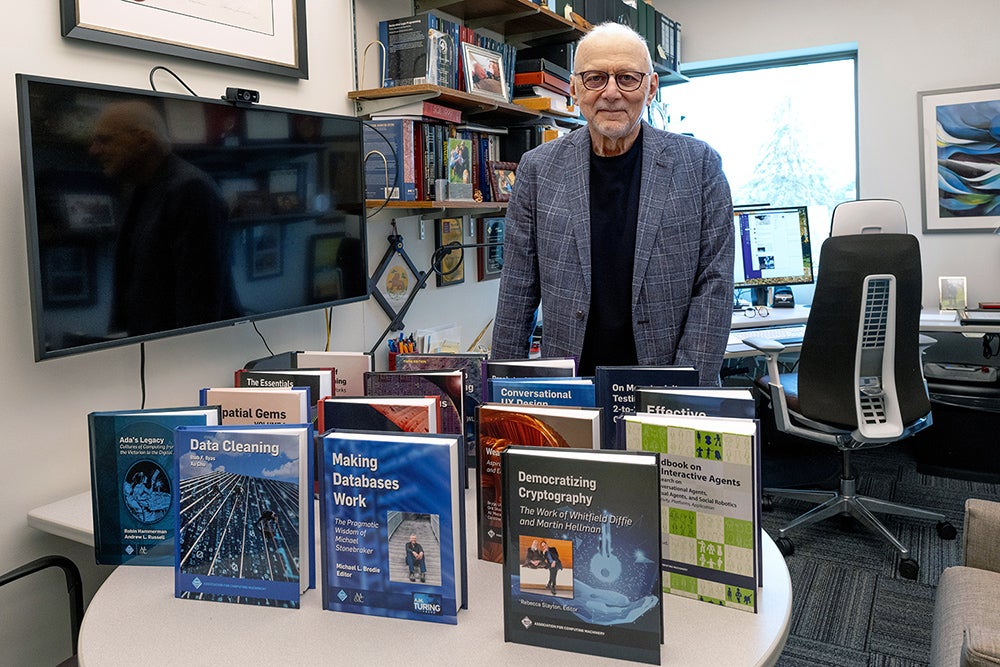 photo of M. Tamer Özsu with ACM Books series