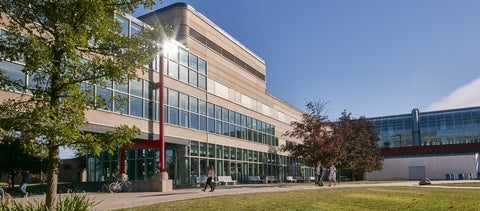 Davis Centre in summer, students walking outside