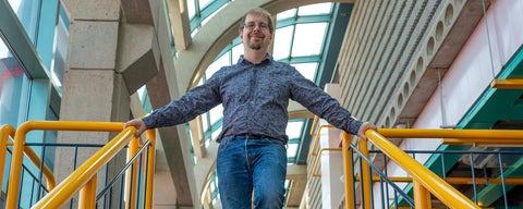 Professor Dan Brown on stairs in Davis Centre