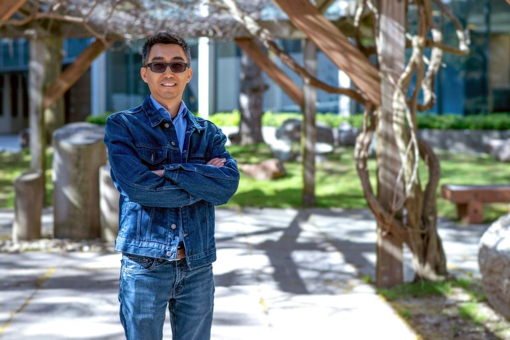 Professor Jian Zhao in Waterloo's Peter Russell Rock Garden
