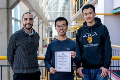 Left to right: Professor Shane McIntosh, PhD candidate Hongxu Xu, Professor Chengnian Sun