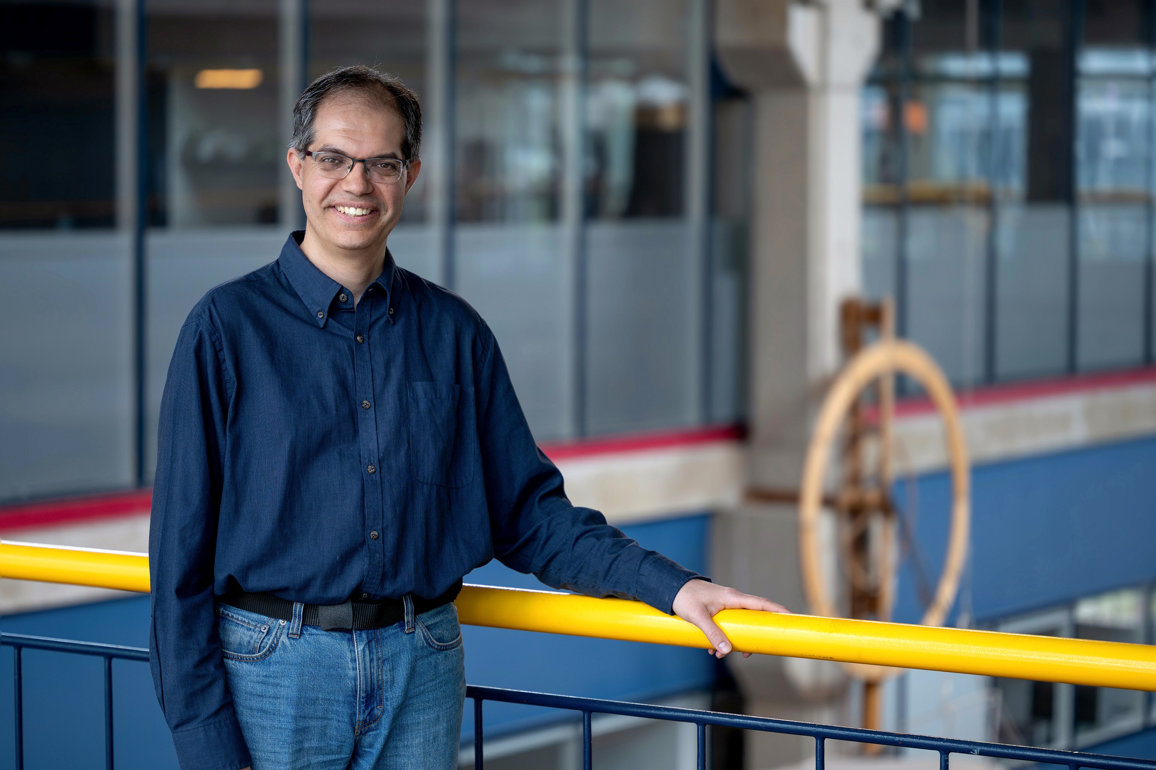Professor Pascal Poupart by clock in Davis Centre