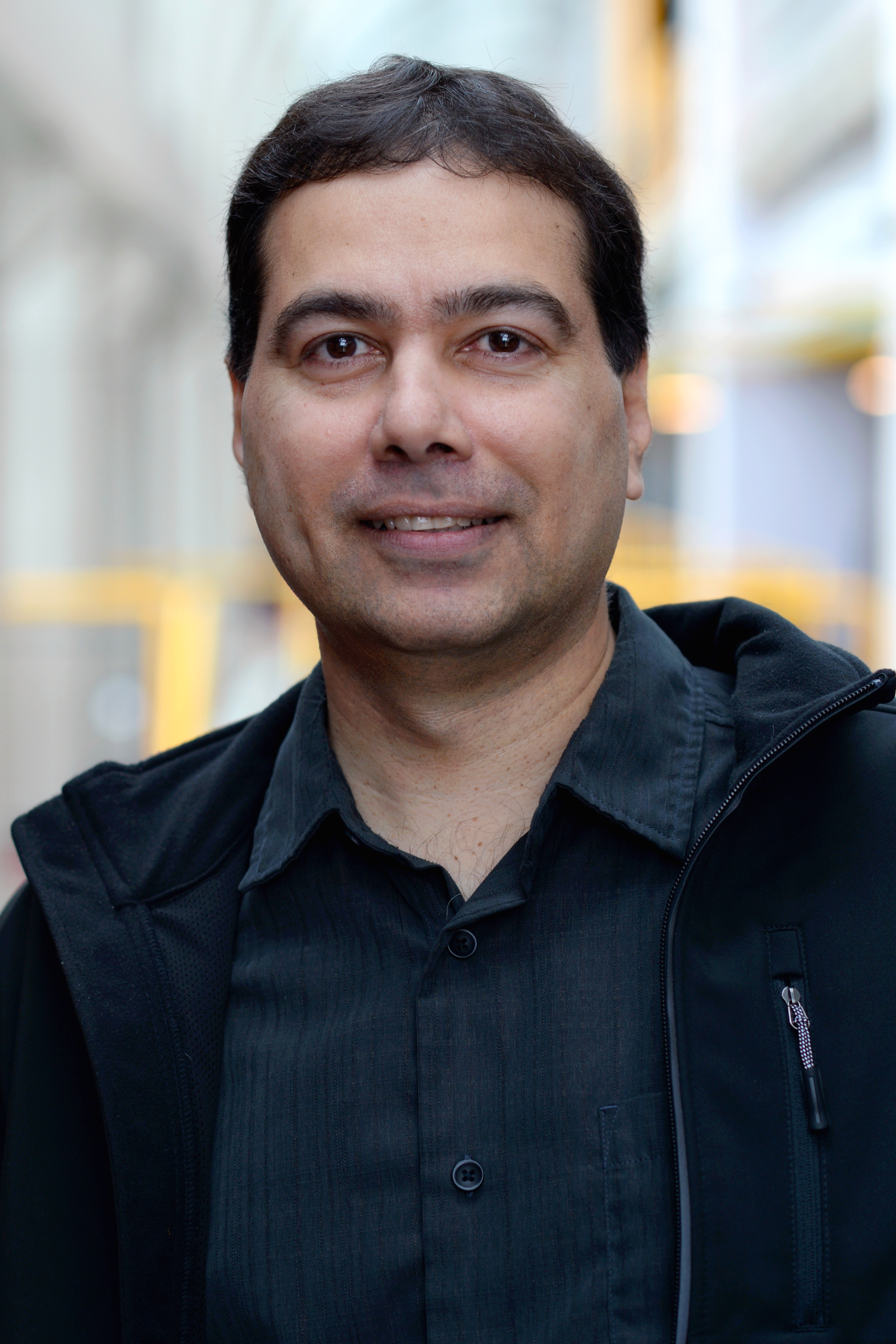 Headshot of Khuzaima Daudjee.